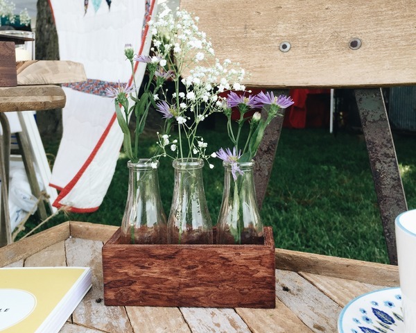 Colorful flowers in a vase and box