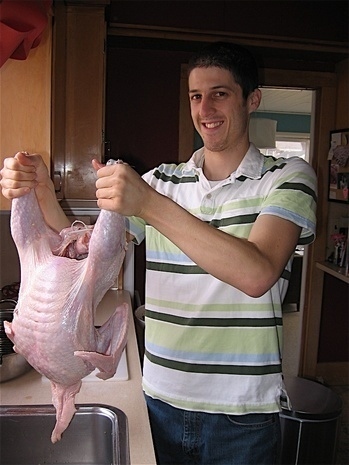 Bruno holding up a chicken