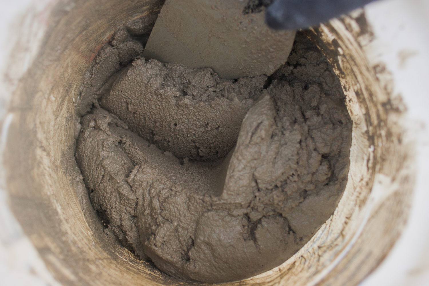 mixing mortar in a bucket