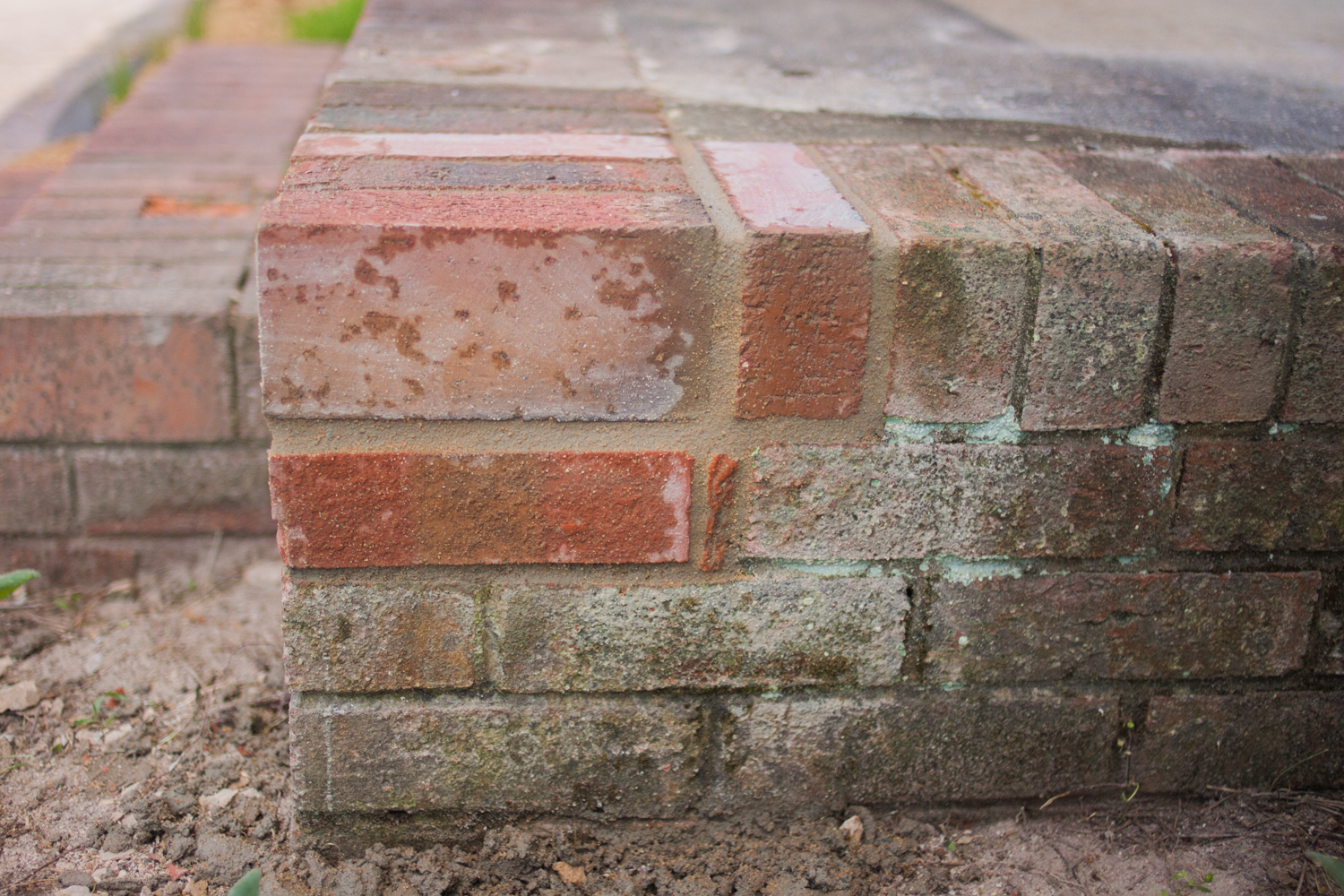 side view of newly repaired brick entryway