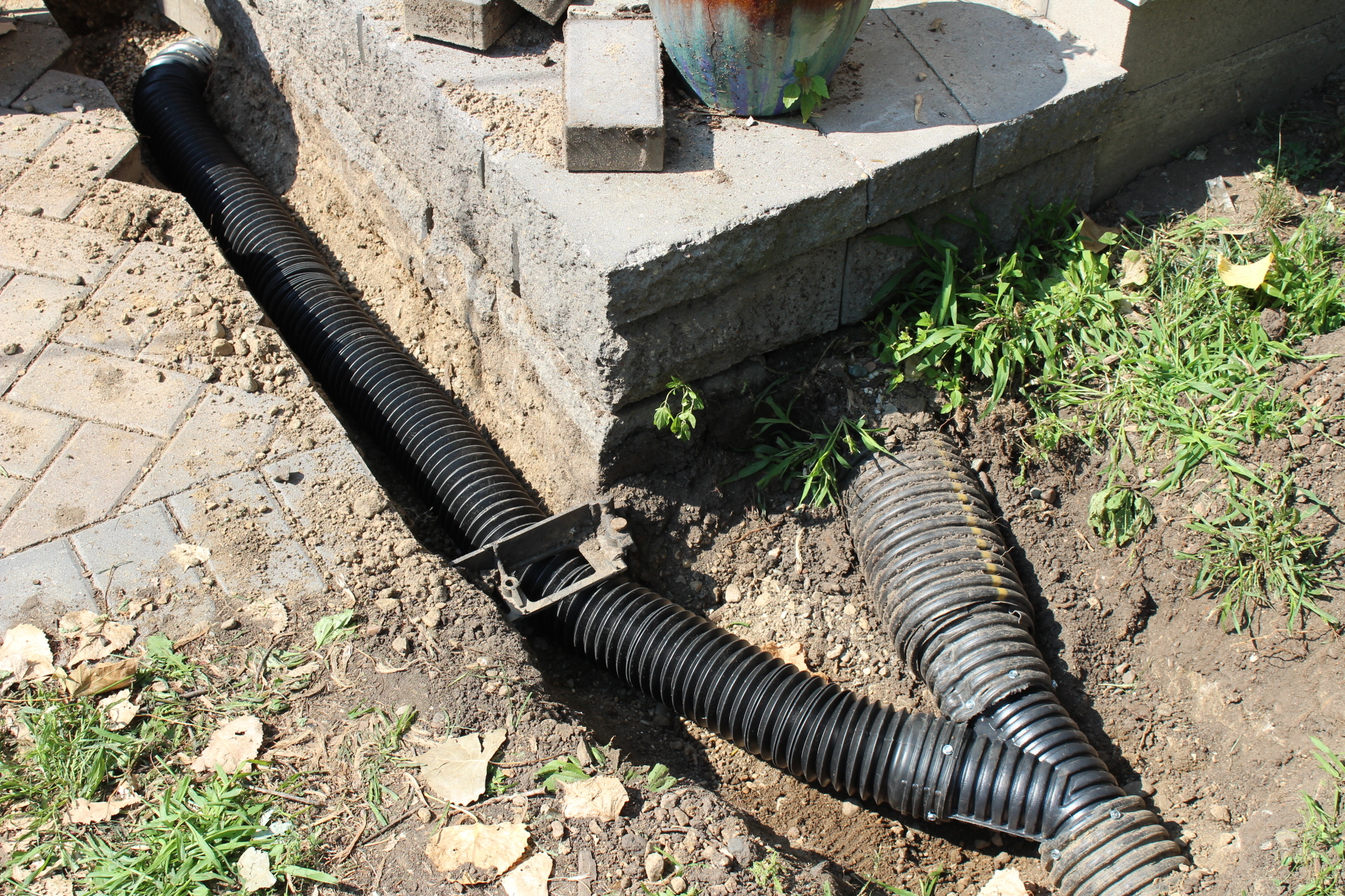 pipes within a trench to drain water
